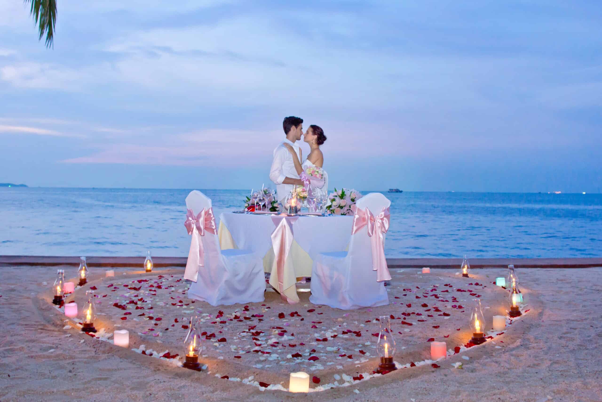 couple sharing a kiss on beach for wedding in pattaya