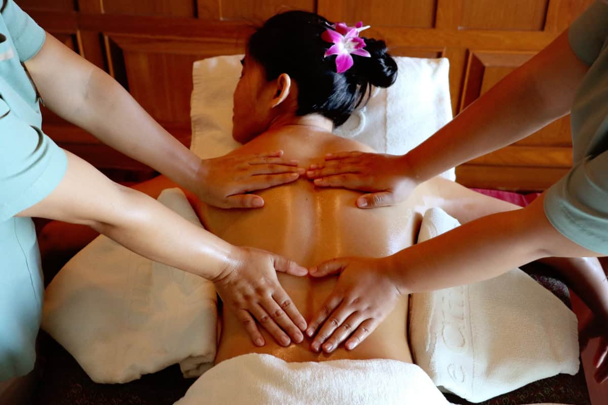 expert massage therapists doing a body treatment at our spa in pattaya