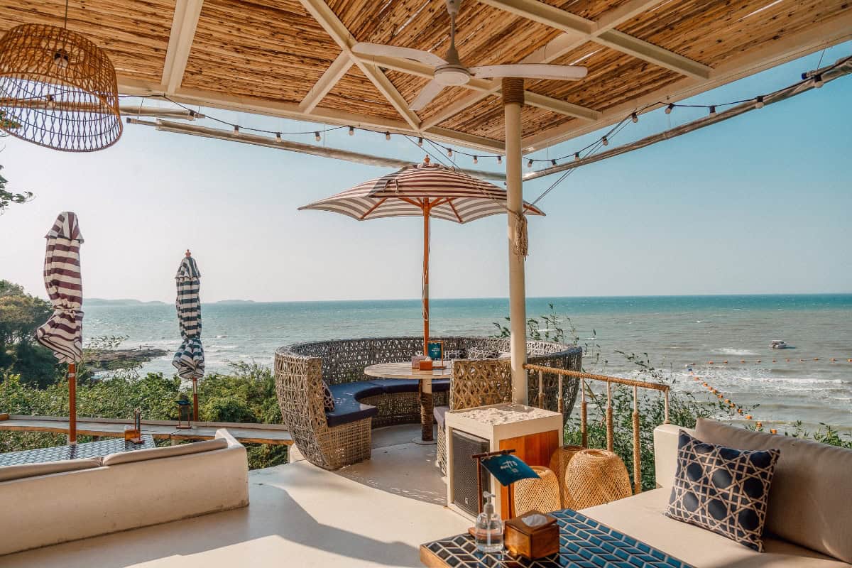 outdoor seating at lunar beach house overlooking the ocean