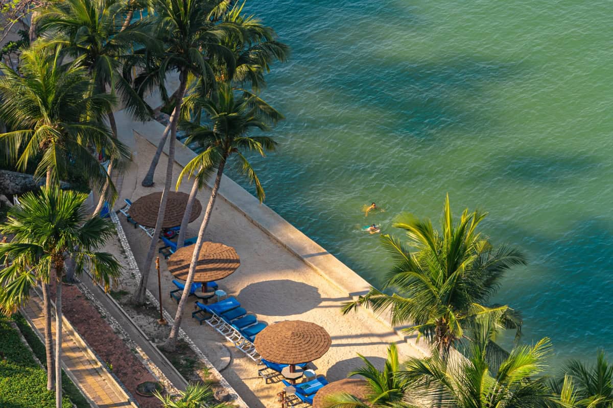 sun loungers on our private beach at our 5-star pattaya hotel